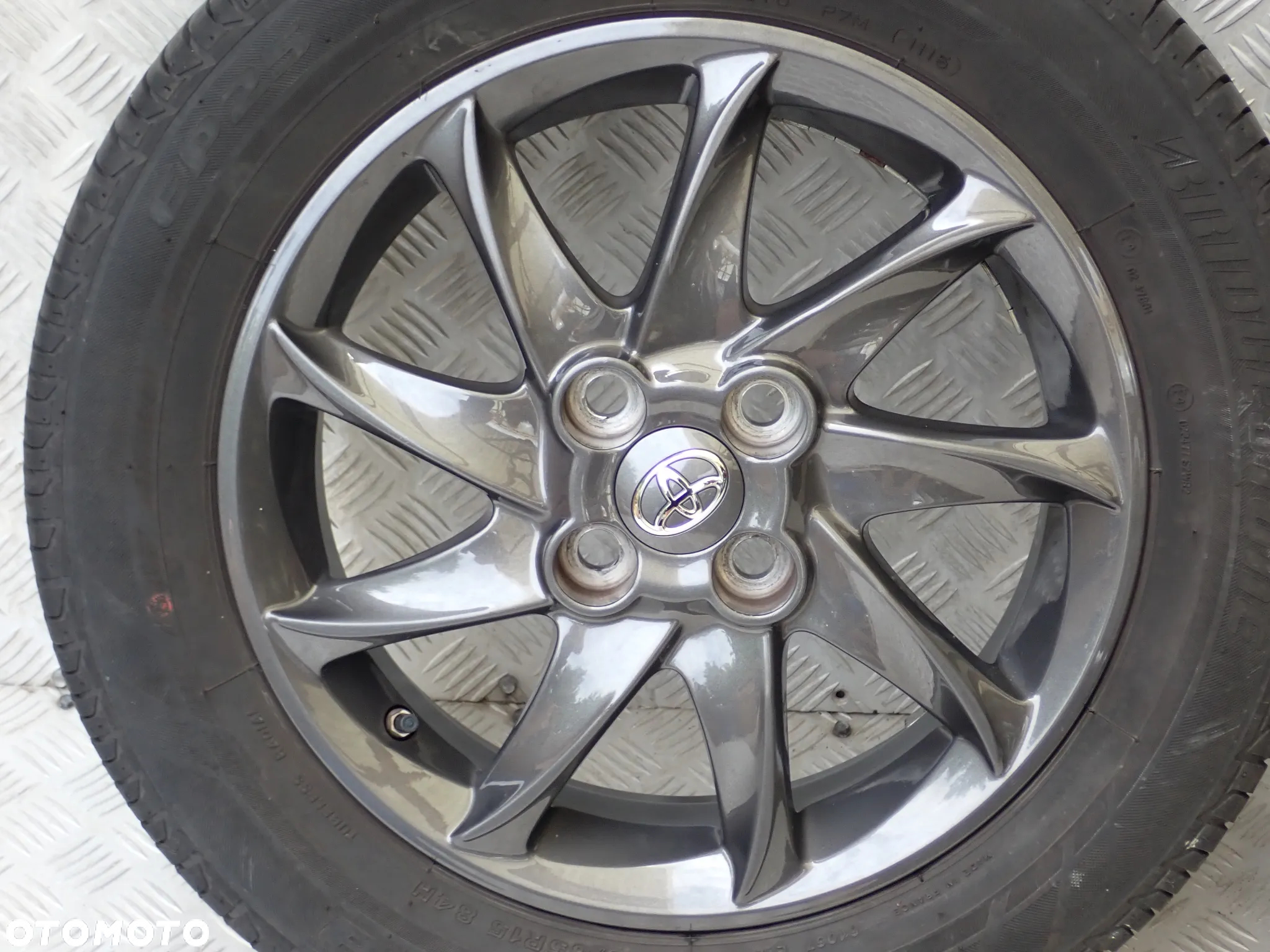 KOŁA FELGI ALUMINIOWE TOYOTA  5JX15 ET 39 4X100 PZ406-B067B Z OPONAMI ZIMA 175/65/15 1950 ZŁ - 4