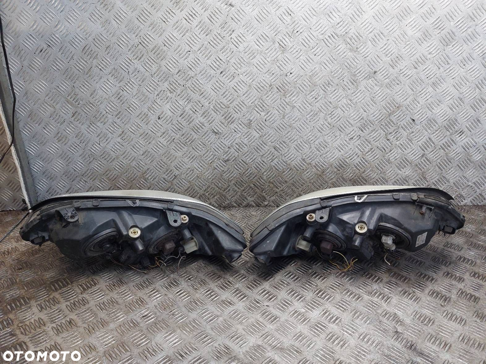 LAMPA LEWY PRZÓD + PRAWY PRZÓD OPEL ZAFIRA A LIFT Z380 90582021 - 9