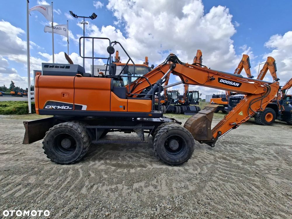 Doosan DX140W-5 - 2