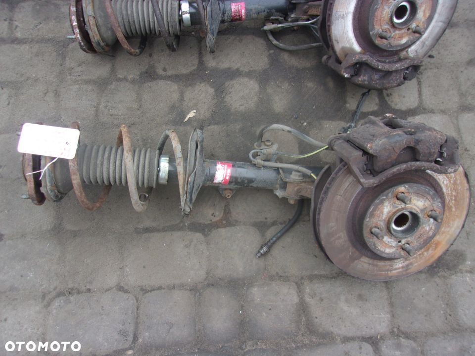 MACPHERSON MAKPERSON LEWY lub PRAWY TOYOTA COROLLA E12 - 1