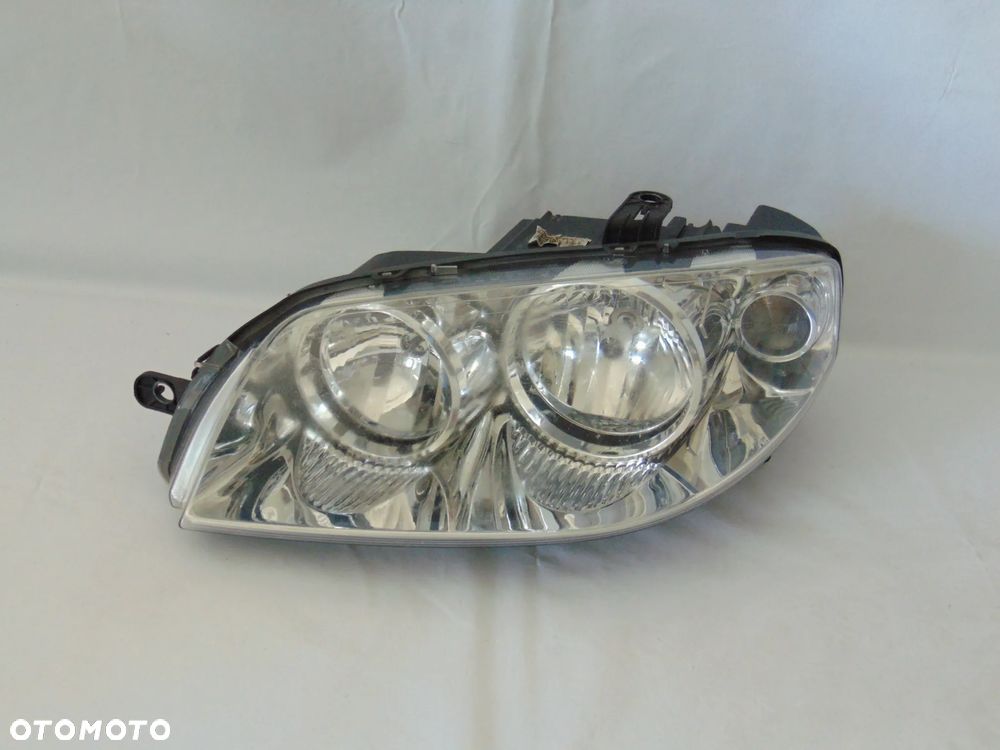 ORYGINAŁ lampa przednia przód prawa Fiat Punto 2 II FL lift 03-10r - 1