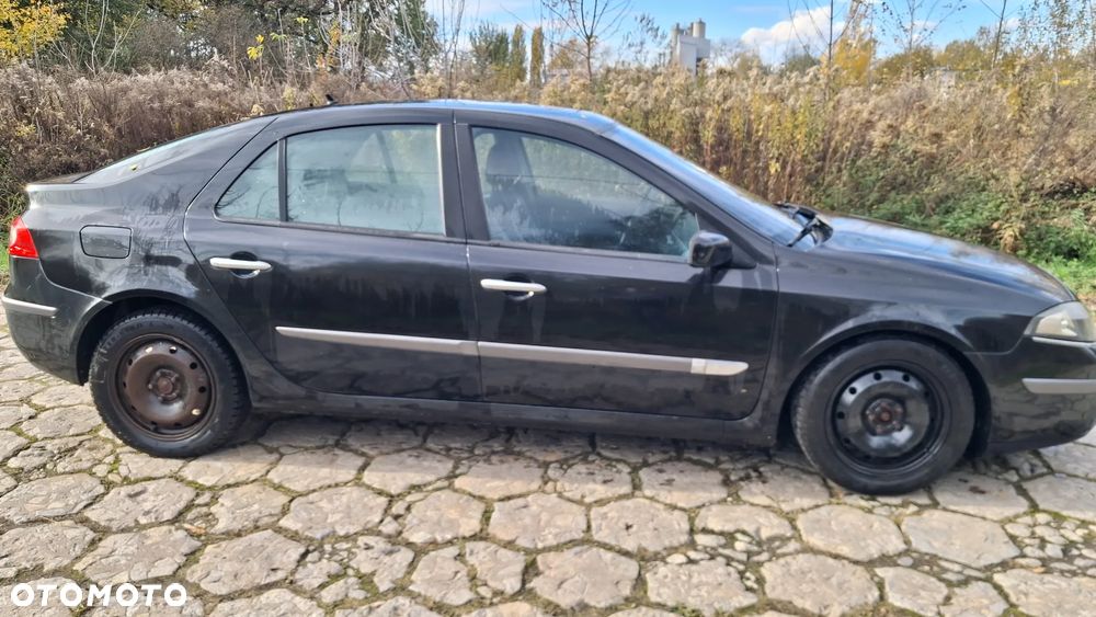 Na części Renault Laguna II HB Lift silnik 1.9 DCI 110 KM F9Q758 skrzynia maska zderzak drzwi klapa szyba fotel kanapa deska lusterko lampa kod lakieru: NV676 - 8