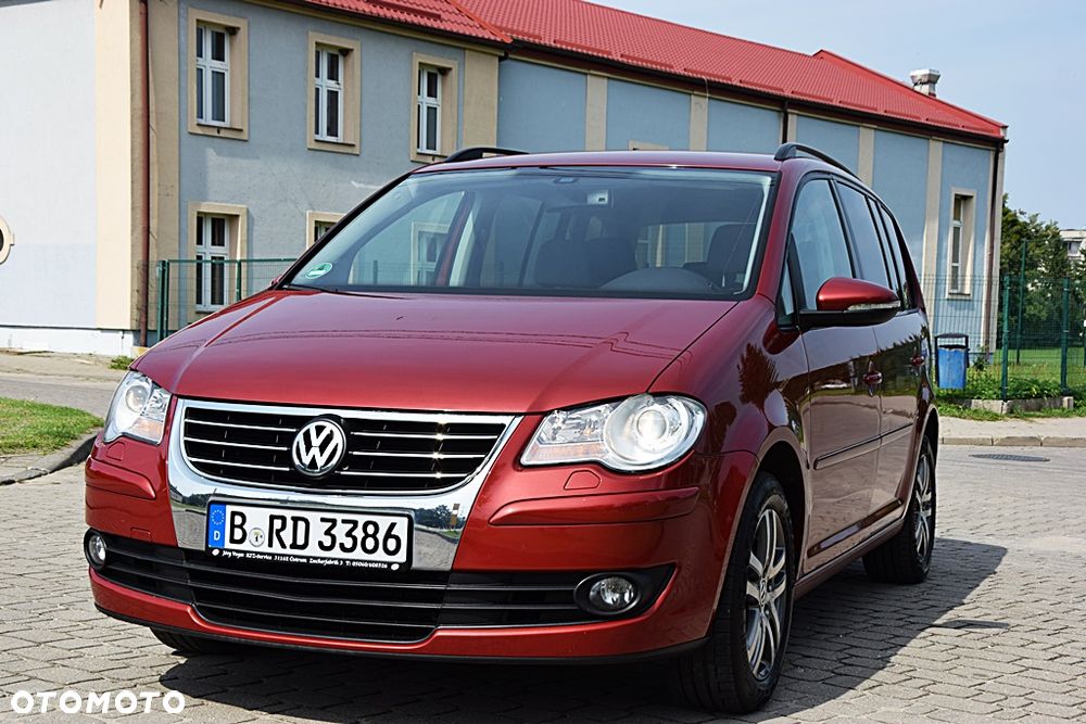 Volkswagen Touran 1.4 TSI DSG Conceptline - 1