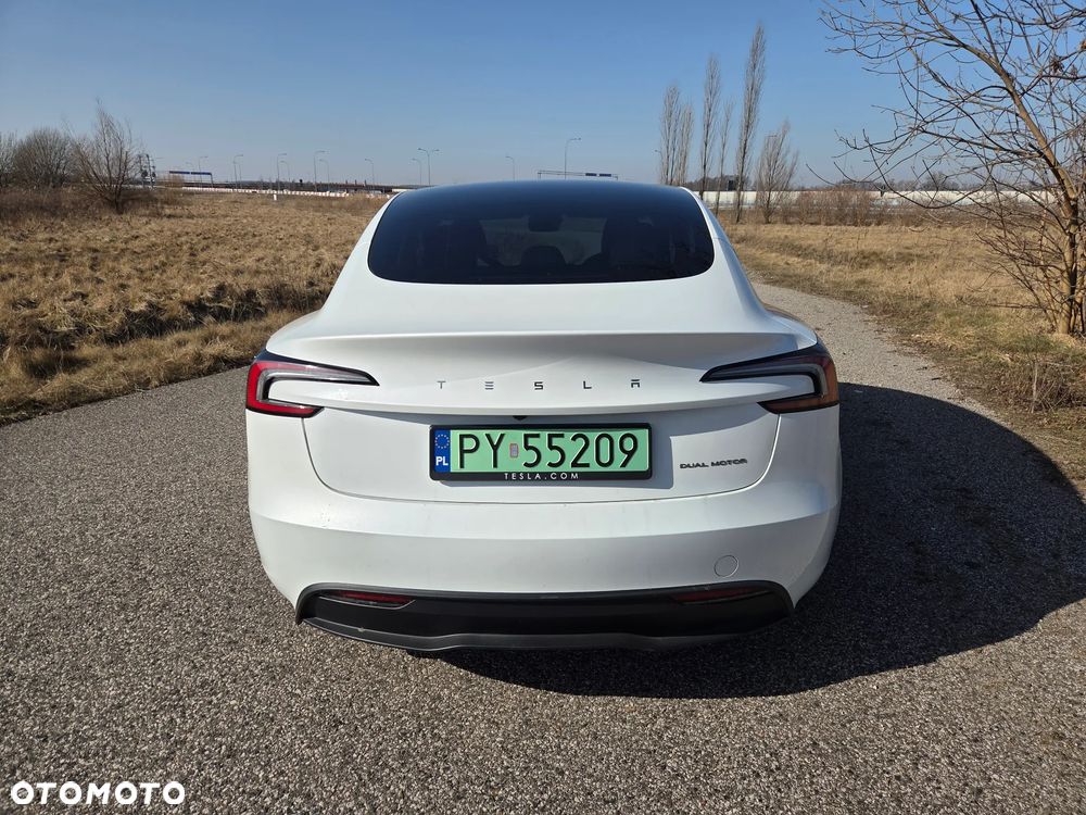 Tesla Model 3 2023 photo 4