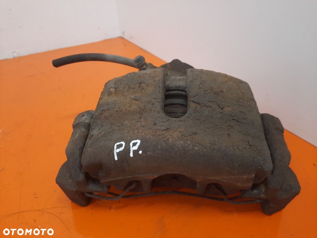 VOLKSWAGEN TOURAN I 03-06 ZACISK HAMULCOWY PRZÓD PRZEDNI  PRAWY  AVQ - 1