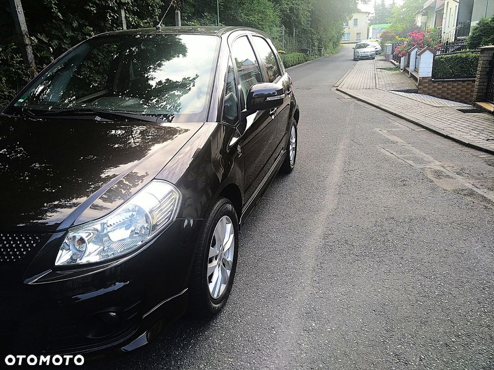 Suzuki SX4 1.6 Comfort Plus - 4