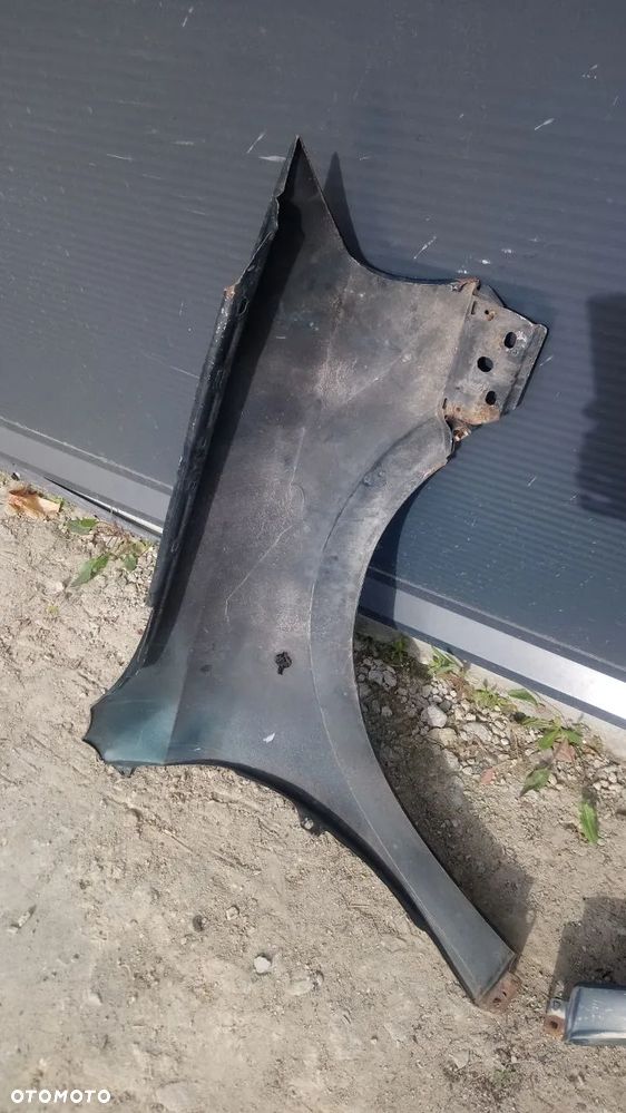 BŁOTNIK ASTRA II PRAWY LEWY PRZÓD - 6