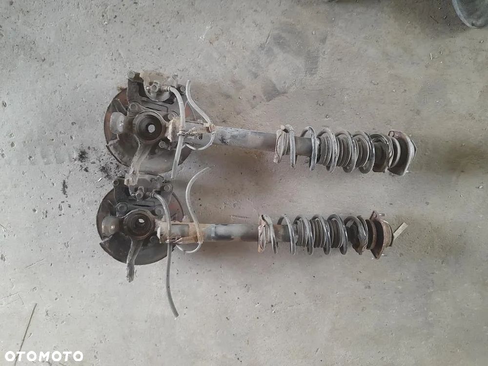 Amortyzator zwrotnica Macpherson Lewy prawy przod Justy IV 4 Sirion II 1.0b - 5