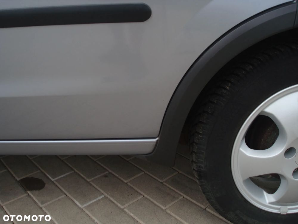 Opel Corsa 1.4 16V Cosmo - 24
