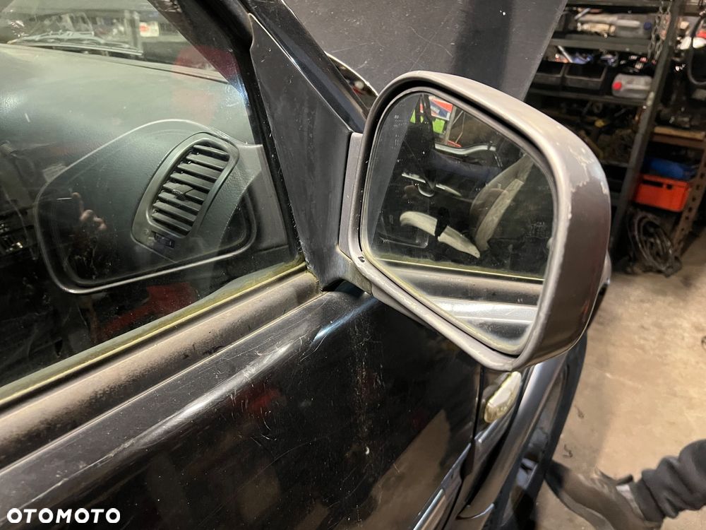 Lusterko lewe prawe ssangyong Musso pickup 2.9td