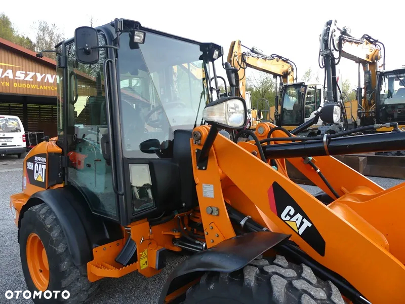 Caterpillar CAT 906H / Z Niemiec / 6424mtg / - 21