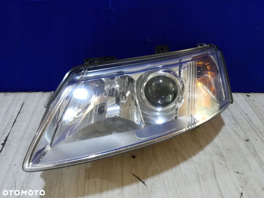 saab 93 9-3 lampa reflektor lewa xenon europa 02/07 - 1