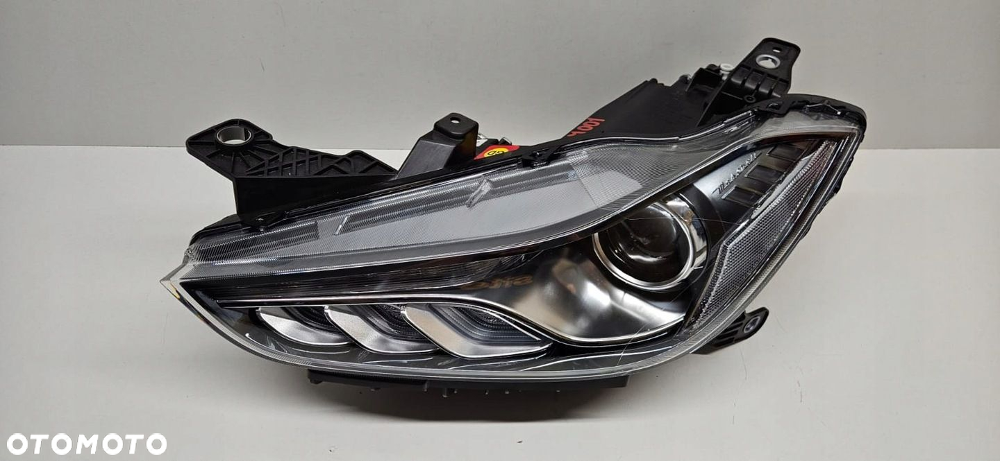 MASERATI GHILBI 3 III REFLEKTOR XENON LAMPA LEWA UK ANGLIA 670106269 NOWA - 2