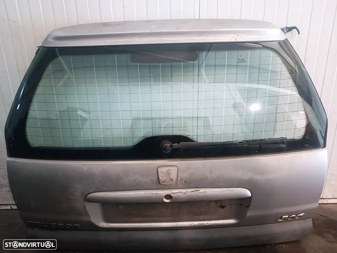 TAMPA DA MALA PEUGEOT 306 BREAK SW - 1