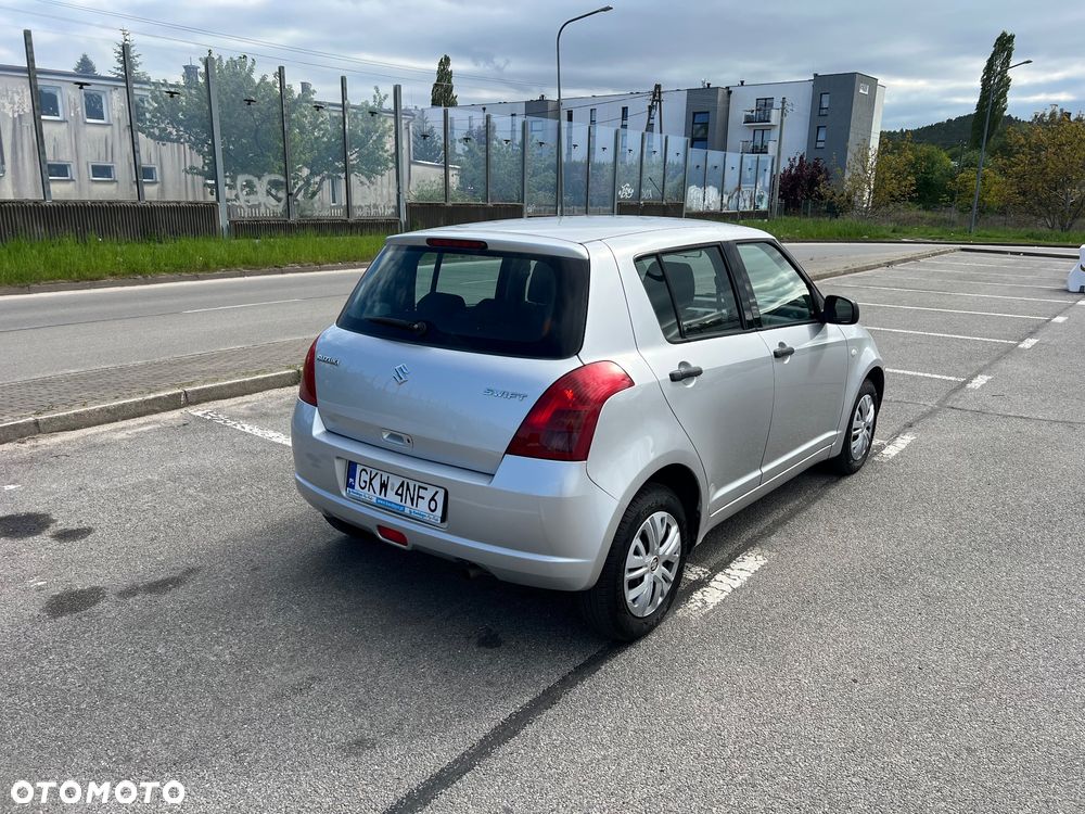 Suzuki Swift 1.3 Club - 10