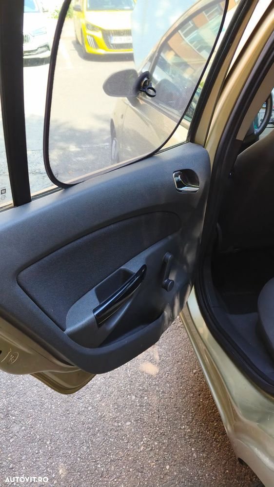 Opel Corsa 1.2i Cosmo - 8