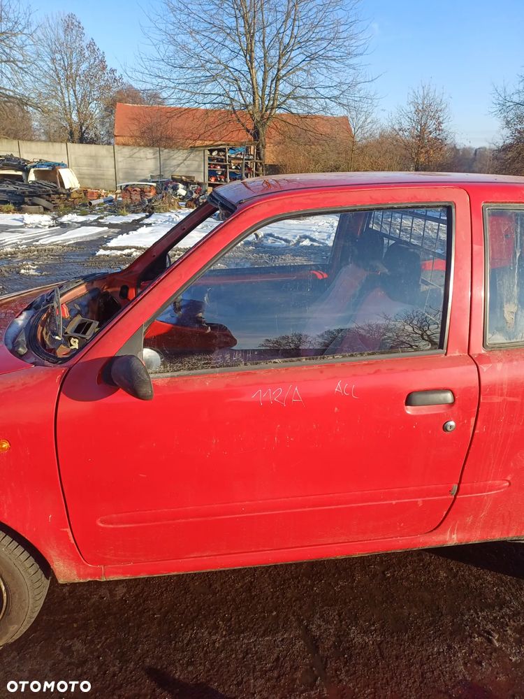 Zamek drzwi lewy przedni Fiat Seicento 2001 kolor 112/A - 1