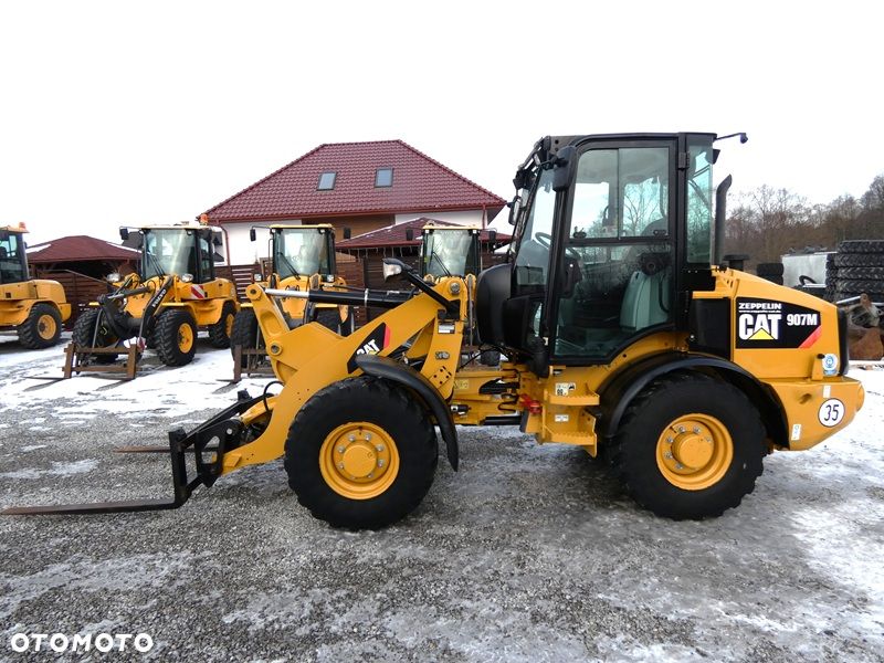 Caterpillar CAT 907M Z Niemiec / Wyjątkowo Wyposażony / 35km/h / 3.050mtg / - 7