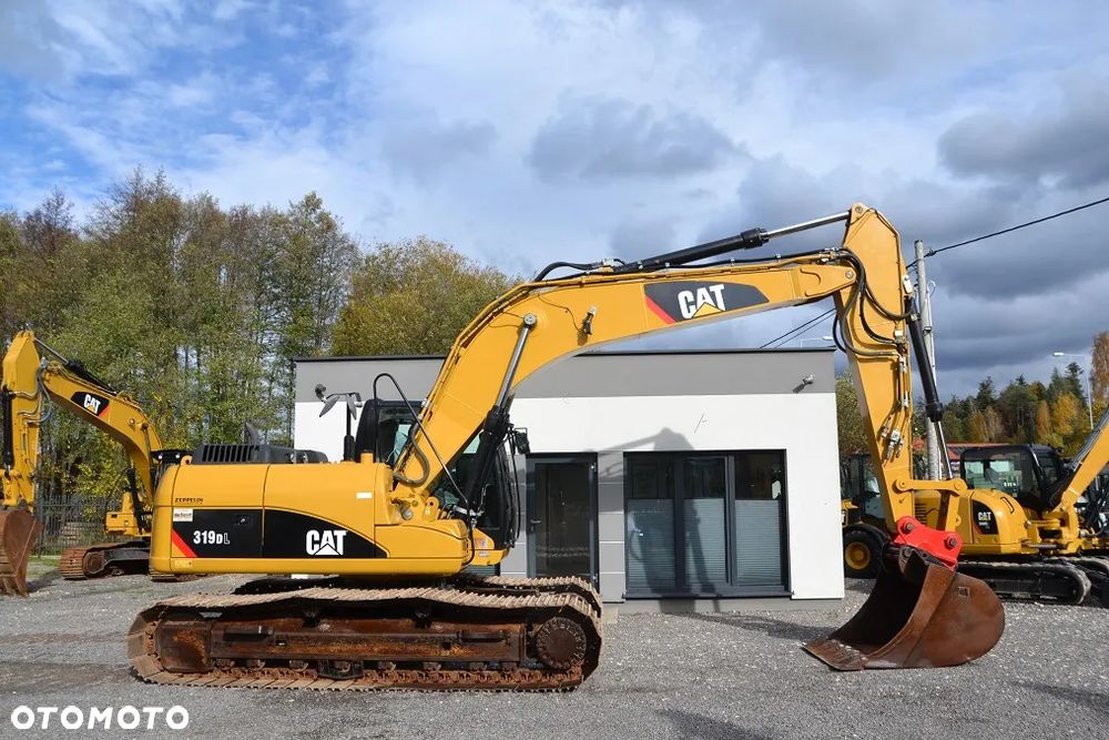 Caterpillar CAT 319 DL - 12