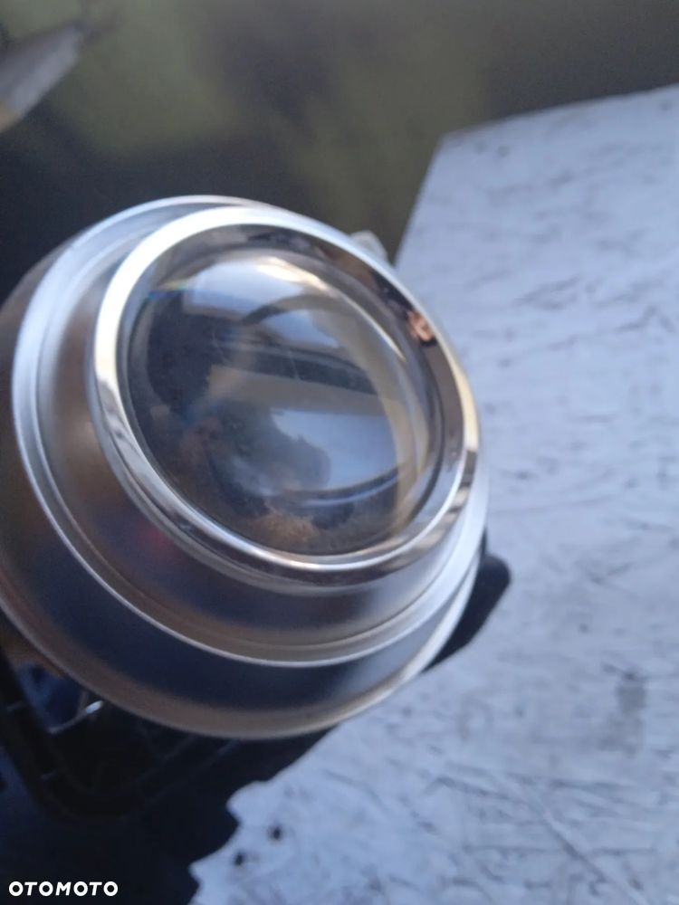 1305310245 SOCZEWKA PRAWEJ LAMPY BI XENON AUDI A4 B7 - 5