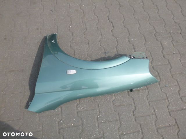 BŁOTNIK LEWY PRZÓD LEWY PRZEDNI OPEL ASTRA II G Z374 - 8