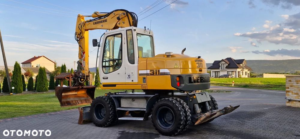 Liebherr A 311 Litronic/ Maszyna sprowadzona/ 8240H/