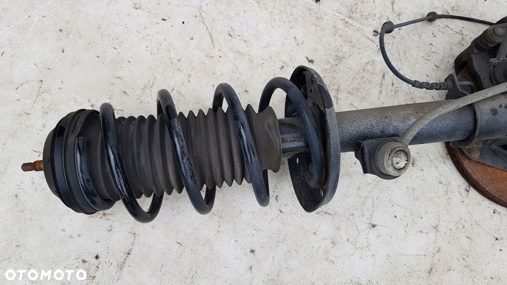 zwrotnica amortyzator lewa przód Opel Adam 1.4 - 6