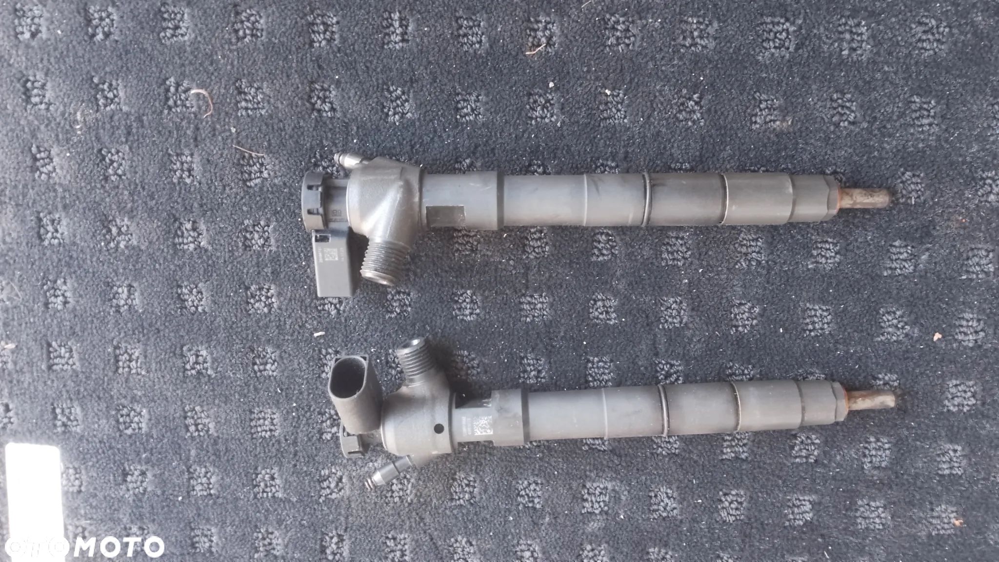 Wtryskiwacz 2.0 TDI 04L130277BA 28543147 VW T6 - 1
