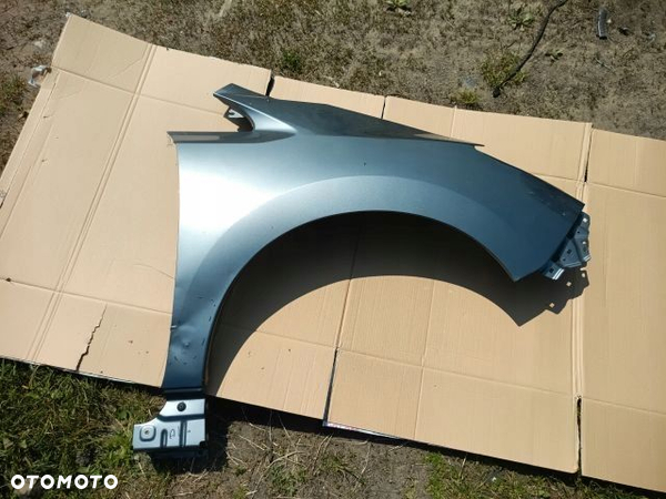 Nissan LEAF II BŁOTNIK PRZEDNI PRAWY PRZÓD ORYG.