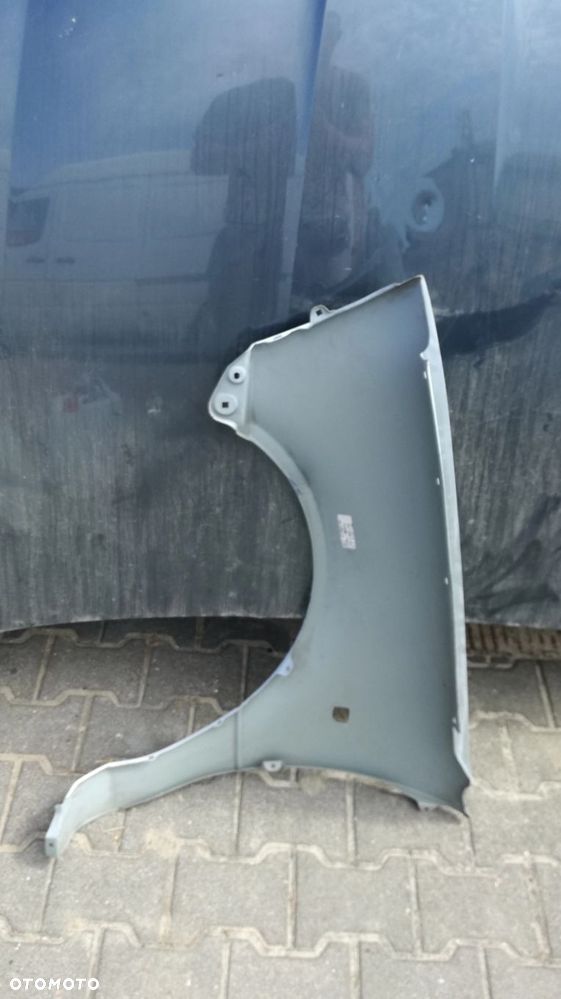 Błotnik Suzuki Swift 1996-2000r. Przód Prawy - 2