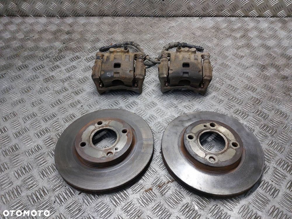 TARCZE HAMULCOWE PRZÓD + ZACISKI FORD FIESTA MK6 1.4 TDCI - 1