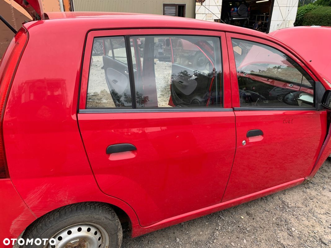 DAIHATSU CUORE VI 03-07 5D DRZWI PRAWY TYŁ - 1