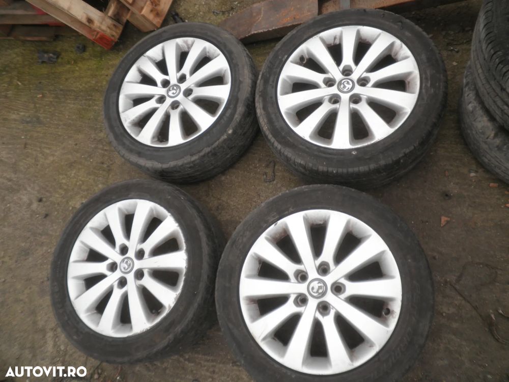 Jante 17" Opel Astra J 5x115 7J ET44 anvelope 225/50/17