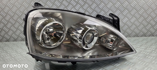 0096726 reflektor lampa prawa przód OPEL CORSA C LIFT 03-06 SOCZEWKA EUROPA