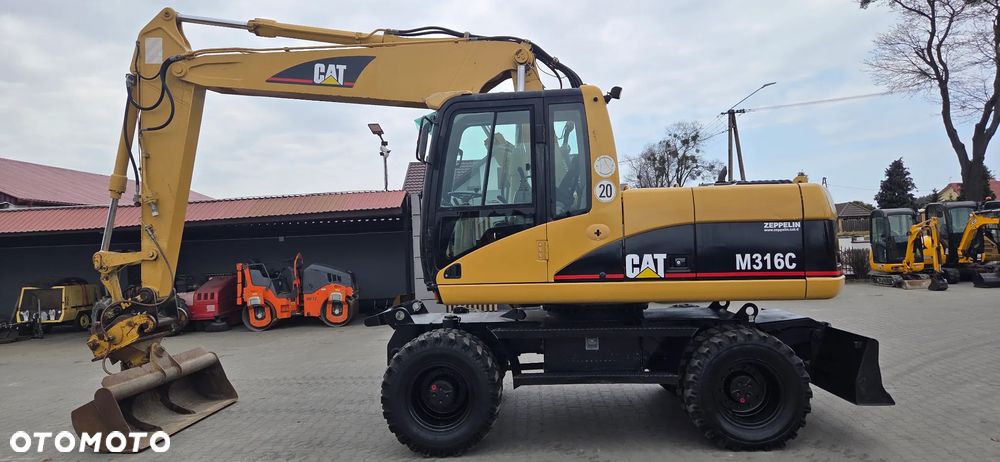 Caterpillar << CAT M316, 2004r, z Niemiec, 2 łyżki!, Fatura Marża, cena brutto!>>