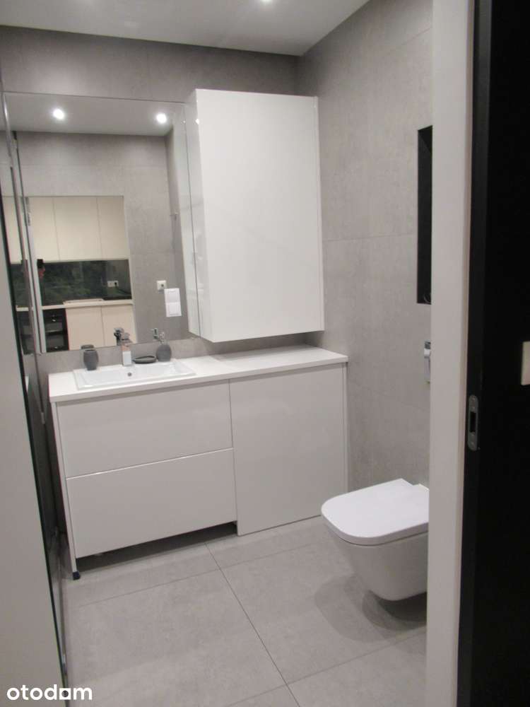 Komfortowy apartament  36m2 z klimatyzacją , garażem, balkonem/centrum
