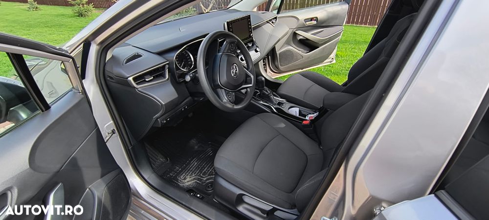 Toyota Corolla 1.8 HSD Business - 8