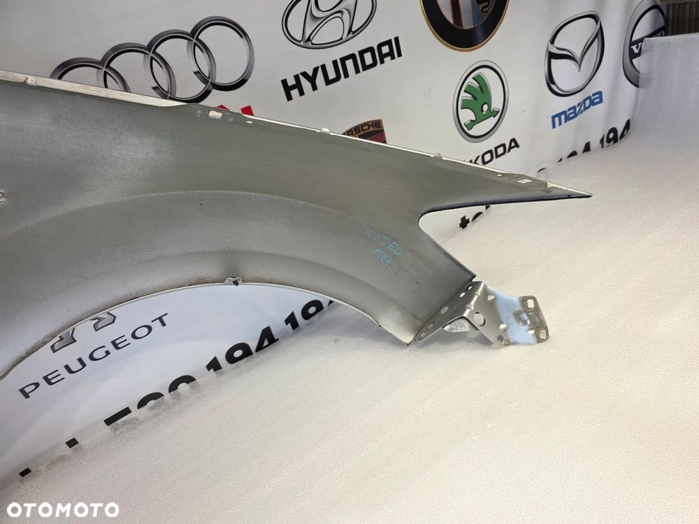 FORD MONDEO MK4 , LIFT 07-14 LEWY BŁOTNIK PRZEDNI PRZÓD NR AUKCJI BŁ249 - 26
