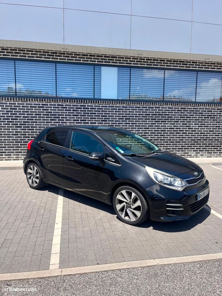 Kia Rio 1.1 CRDi Uniq - 9