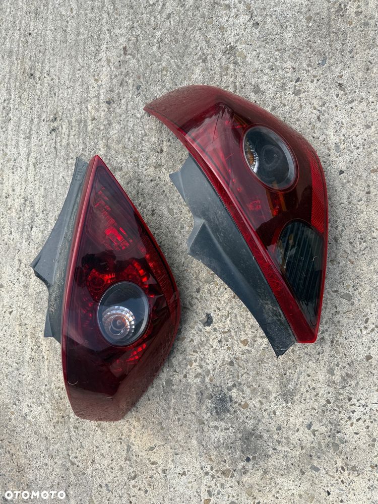 OPEL CORSA D GSI OPC Lampy tylne lampa tył ciemne - 1