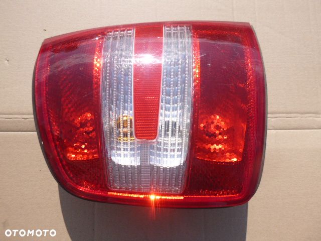 LAMPA LEWY TYŁ LEWA TYLNA SKODA FABIA I KOMBI LIFT 05-08