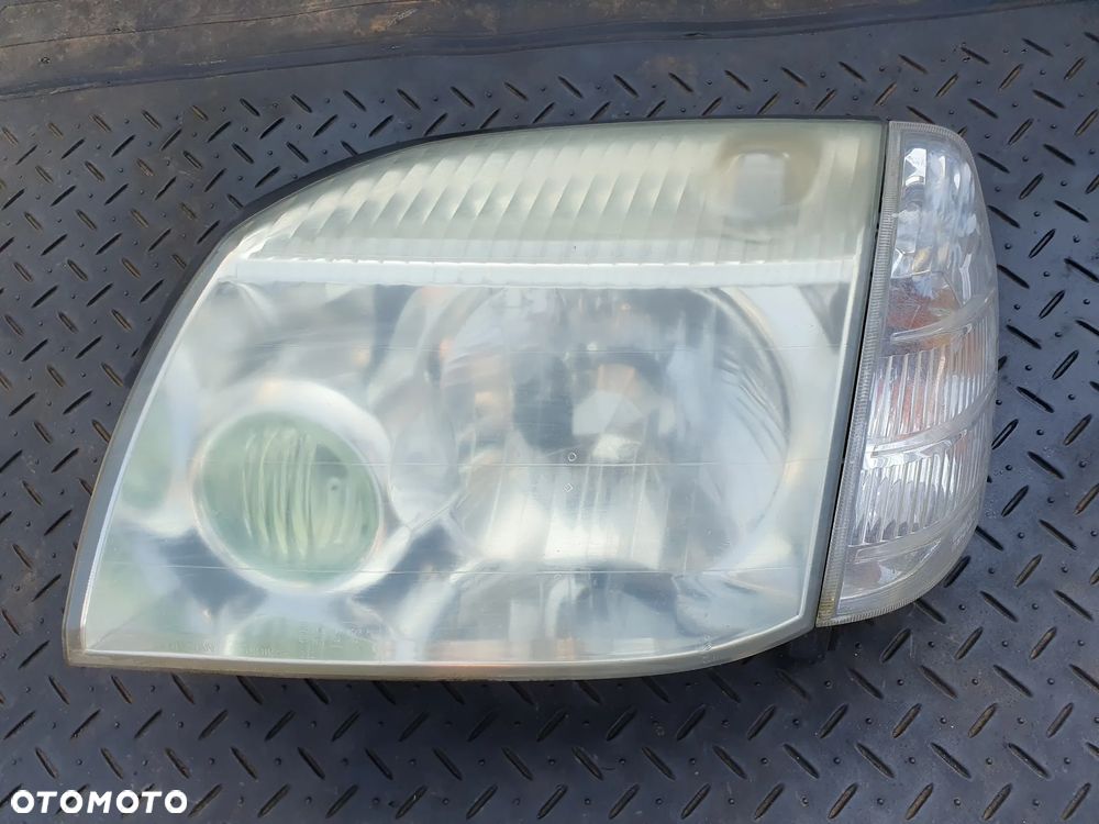 LEWA LAMPA PRZÓD PRZEDNIA NISSAN X-TRAIL T30 2001-2007 EUROPA - 1