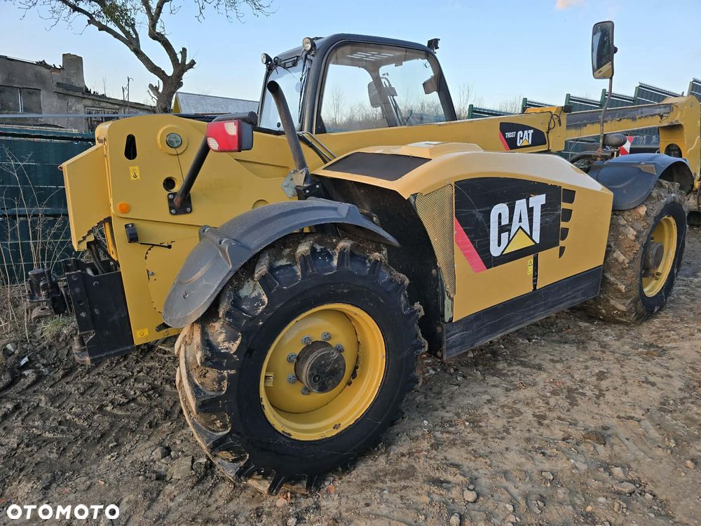 Caterpillar TH 337 AG  PREMIER 1WŁ SALONOWY - 13