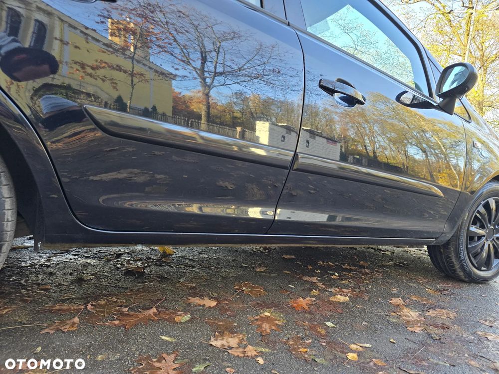 Opel Corsa 1.2 16V Cosmo - 34