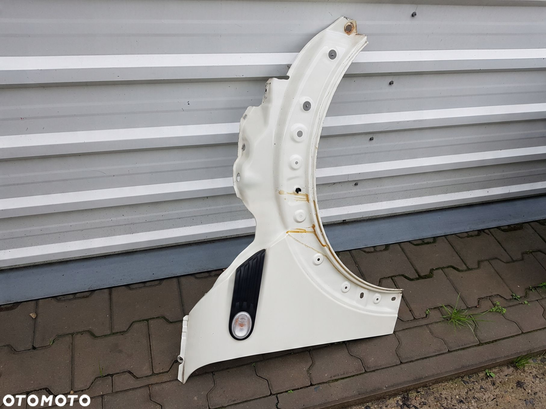 MINI COOPER R56 R55 BŁOTNIK PRAWY PRZÓD 850 - 2