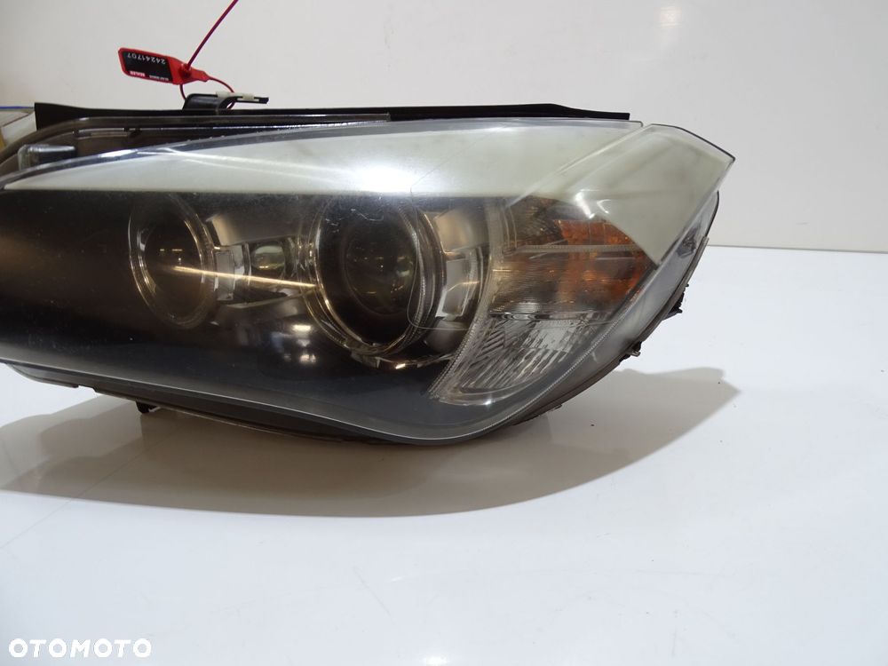 LAMPA LEWA PRZEDNIA XENON BMW X1 E84 OE 2990009 - 2