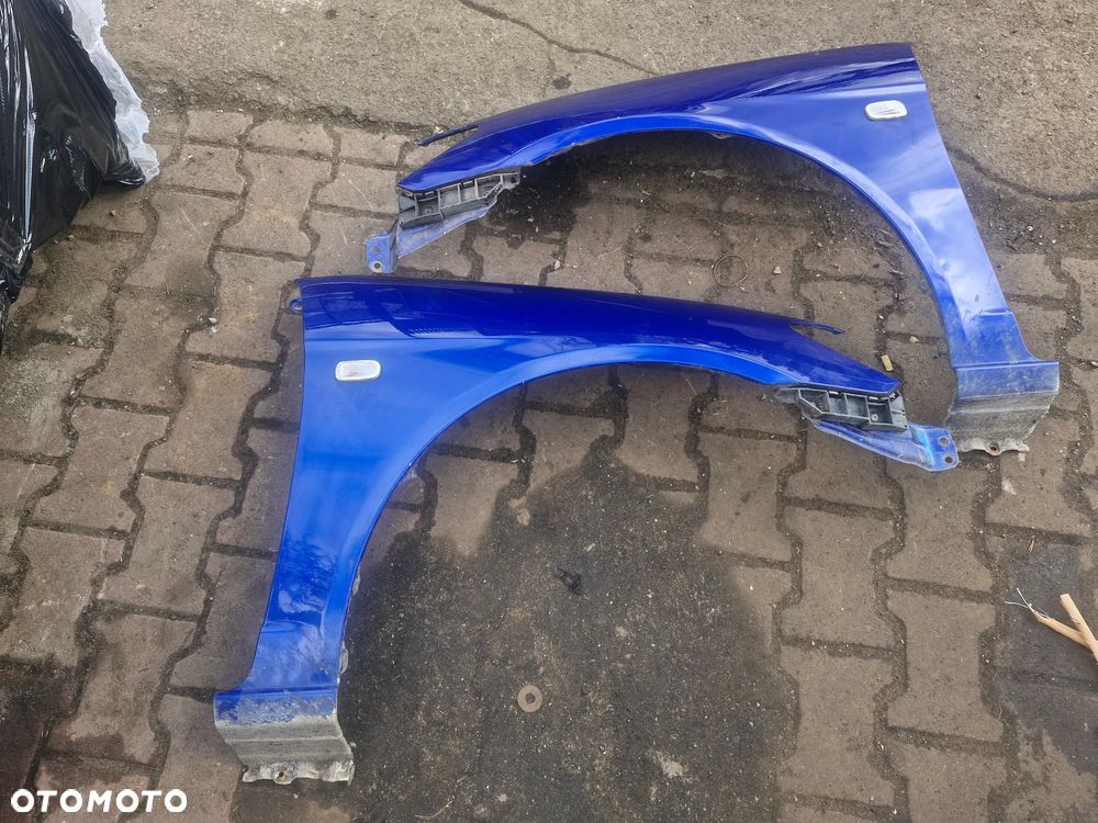 Błotnik przód prawy lewy HONDA CIVIC VII B529P COUPE