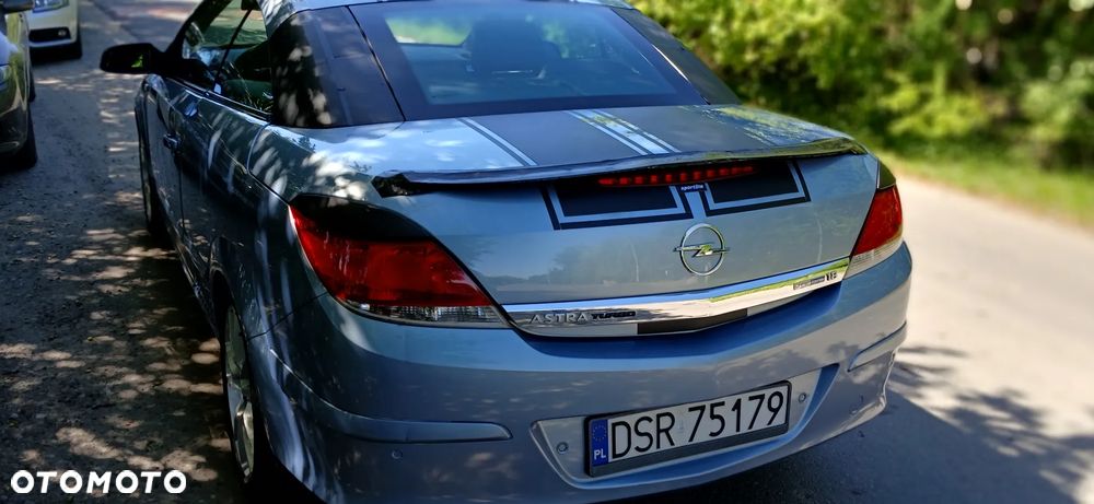 Opel Astra 1.8 111 - 11