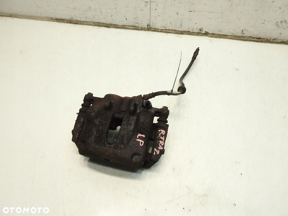 ZACISK HAMULCOWY LEWY PRZÓD RENAULT TRAFIC II 1.9 DCI - 7