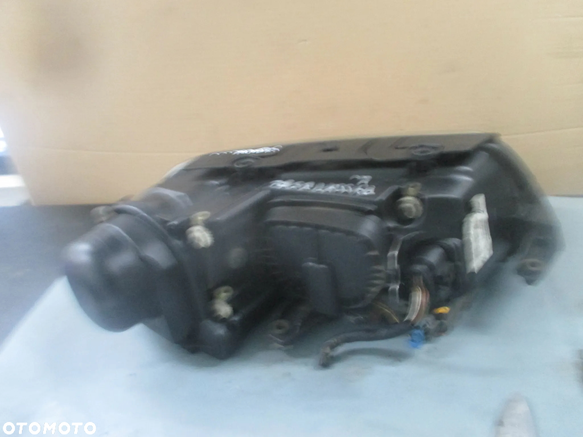 lampa lewa VW Passat B5 FL Xenon Hella Europa - 7